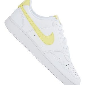 White & yellow low top Nikes